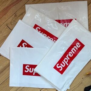 Supreme Red and White Logo Bags